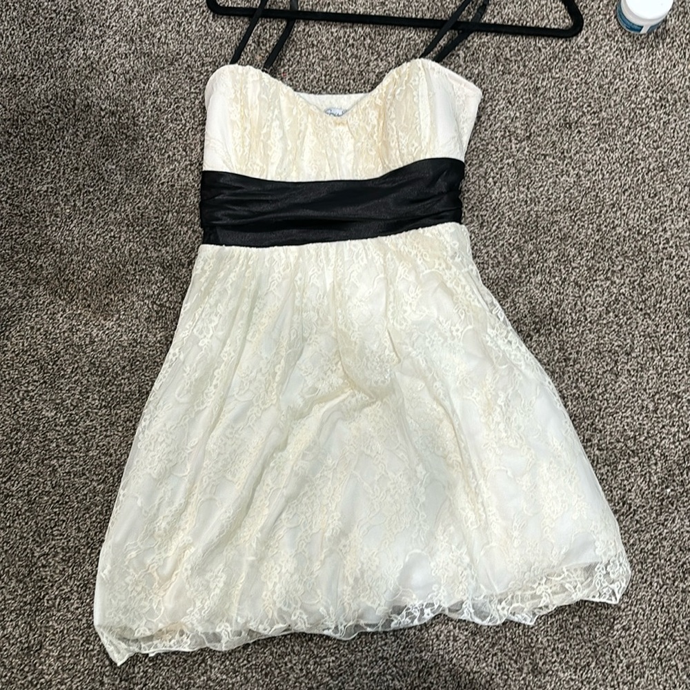 White mini dress with white lace flower print overlay